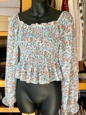 BEYOND THE RADAR Smocked Floral Peplum Blouse - Light Blue with floral print